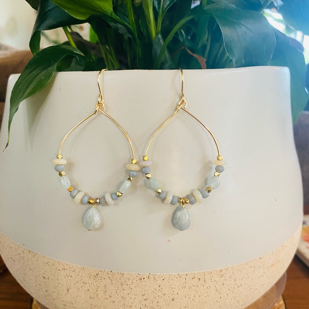 Gold earrings with blue stones & opals